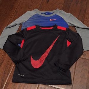 2 Nike long-sleeve Dry-Fit Shirts.